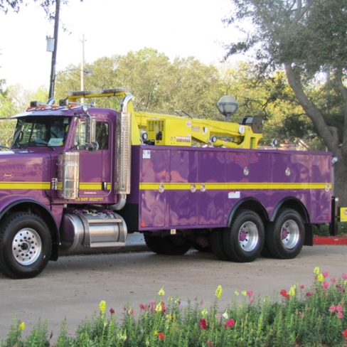 Custom purple and yellow utility truck