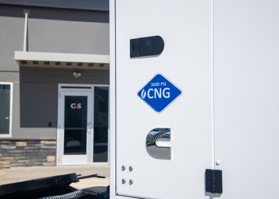 Close up of CNG logo on Cummins Clean Fuel Technologies CNG fuel system