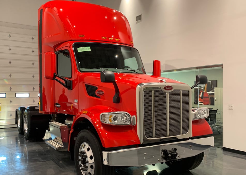 Red Peterbilt truck with Back of Cab CNG Fuel System