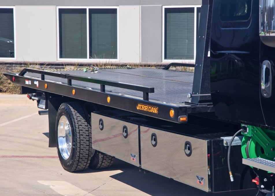 Close up of Jerr-Dan flatbed tow truck