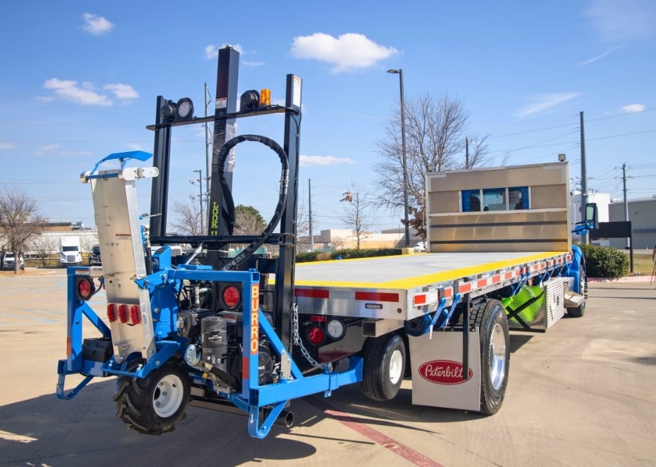 Close up of flatbed truck body with custom tool rack