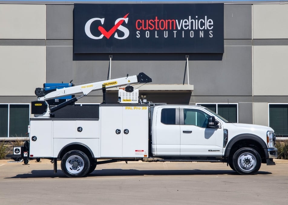 White Ford truck with Palfinger Pal Pro 39 service body with crane