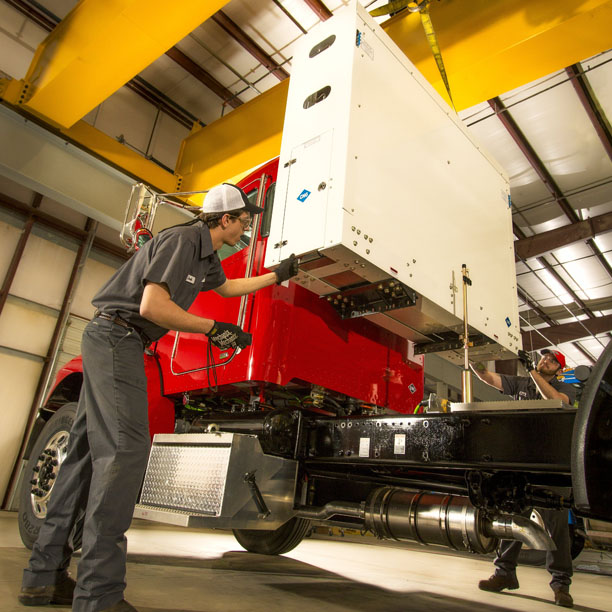 Tech installing CNG fuel system