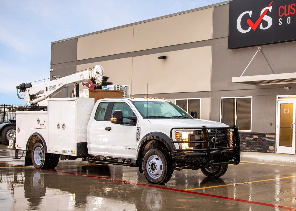 Side view of Ford truck with Palfinger service truck body