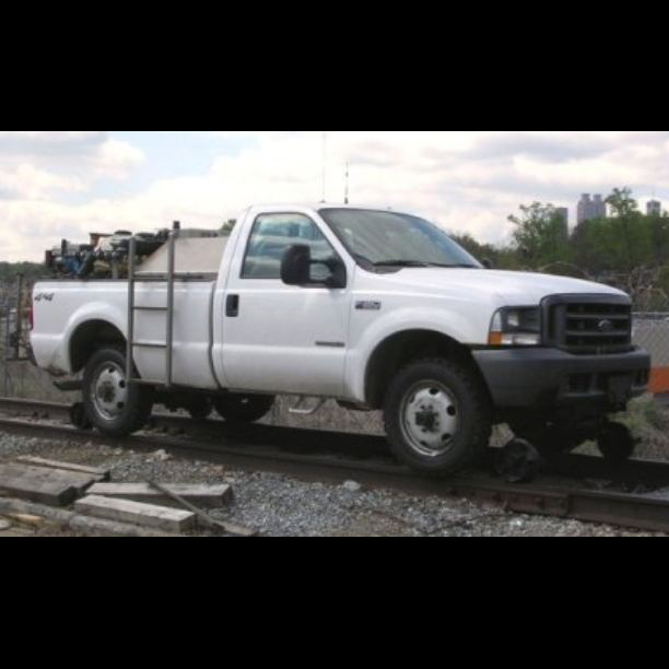 Ford pickup with hi-rail gear