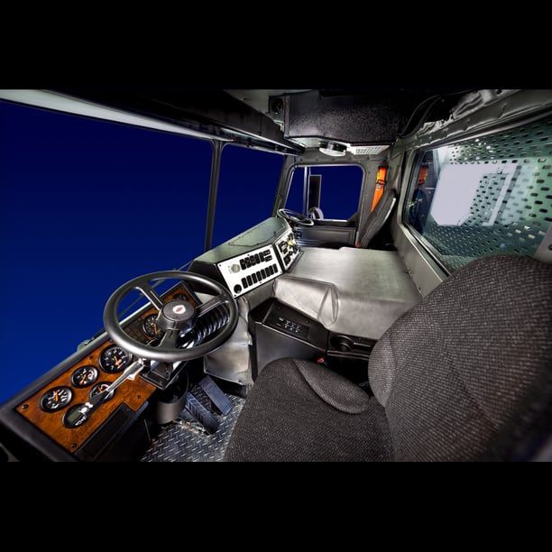 Cab with dual steering wheels