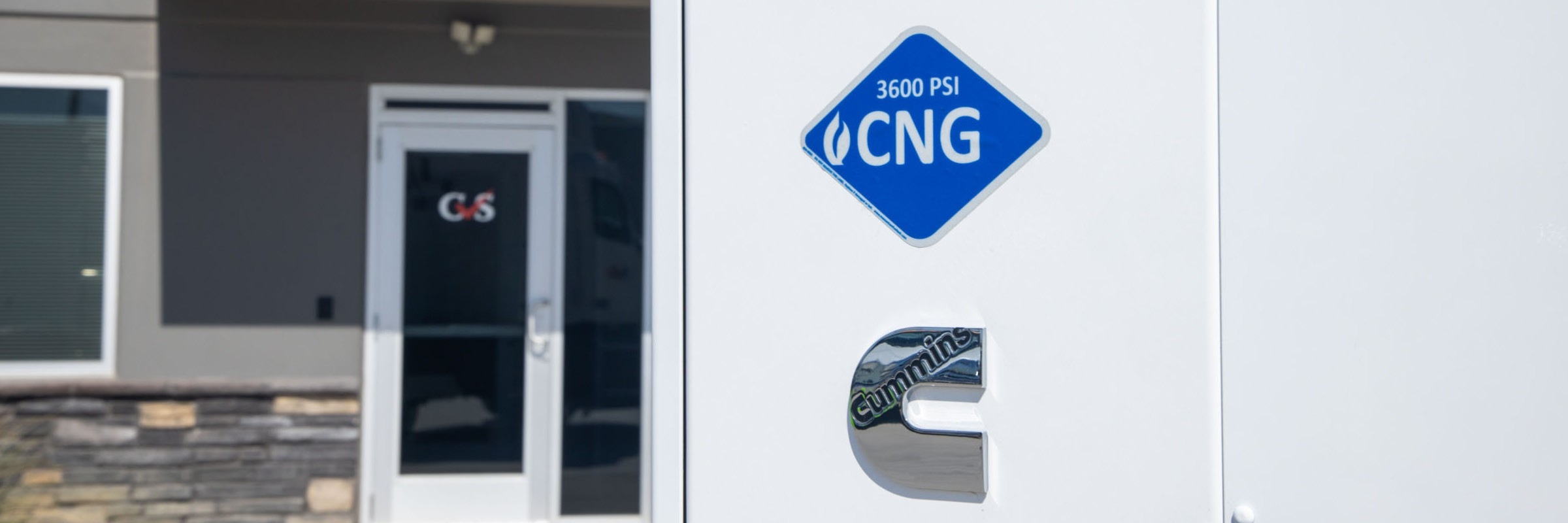 Close up on CNG logo on Cummins Clean Fuel Technologies CNG Fuel System
